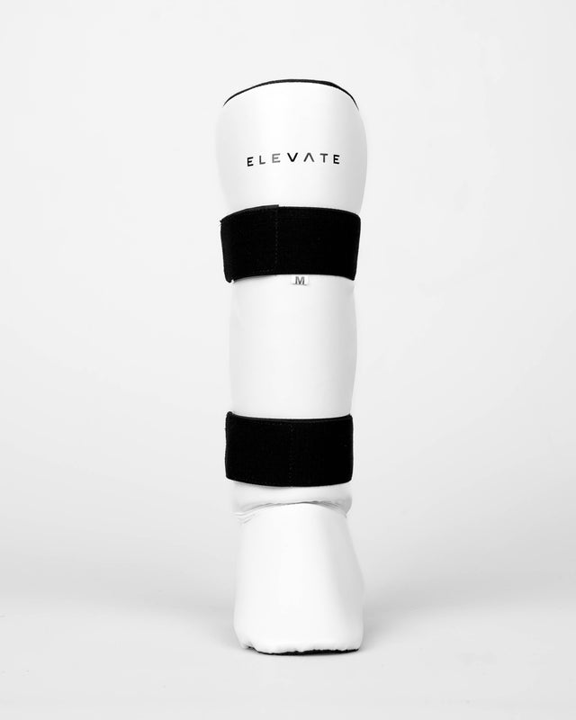 Espinilleras Elevate Prime – Blanco