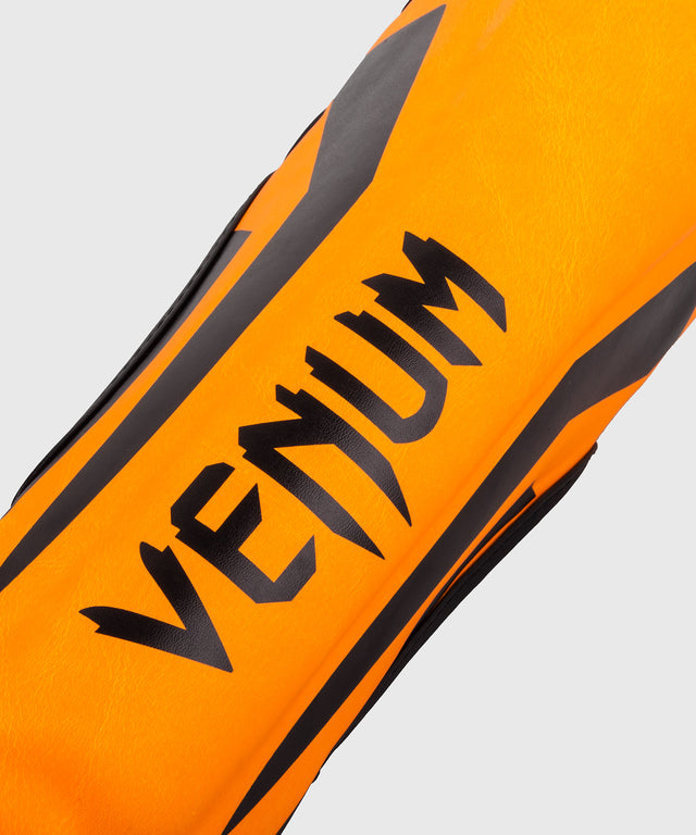 Espinilleras Venum Elite – Naranja Neón