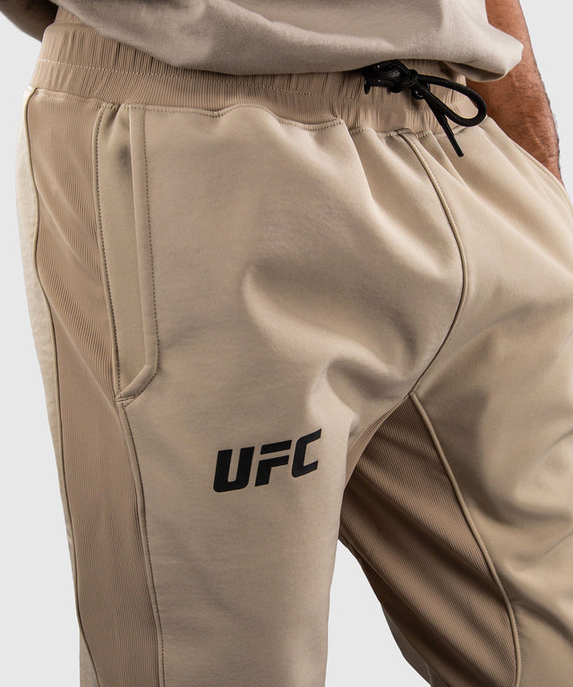 Tepláky Venum UFC Unity – Písek