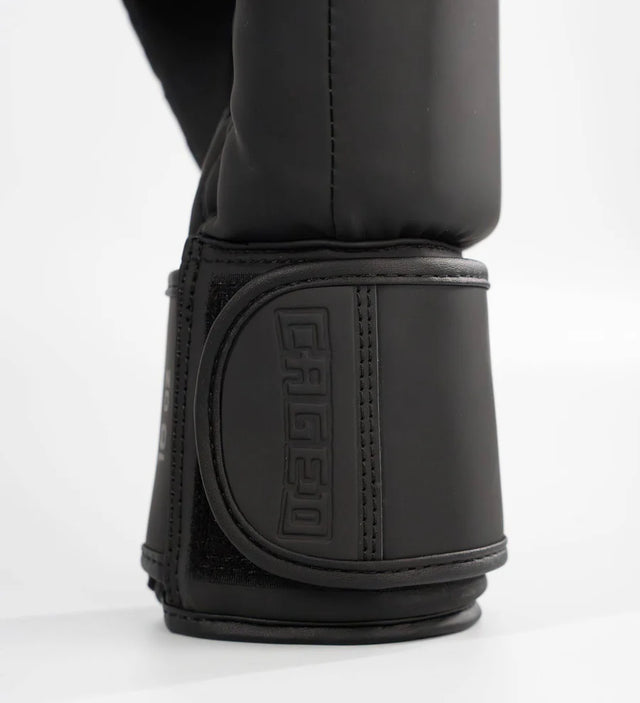 Bundel Guantoni da boxe + Paratibie Caged Shadow