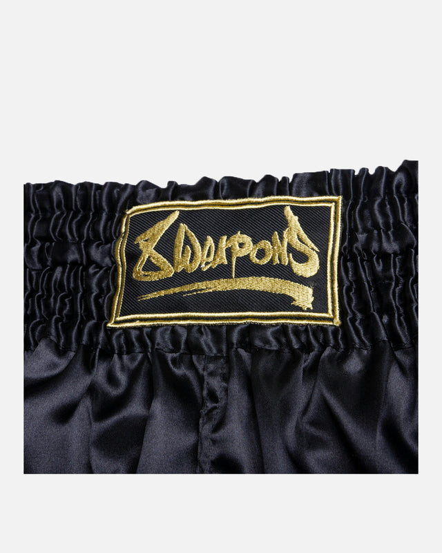 Pantaloncini Muay Thai 8 WEAPONS Strike – Nero/Oro