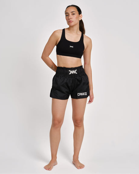 Pantaloni scurți Muay Thai Caged Classic – Negru/Alb femei