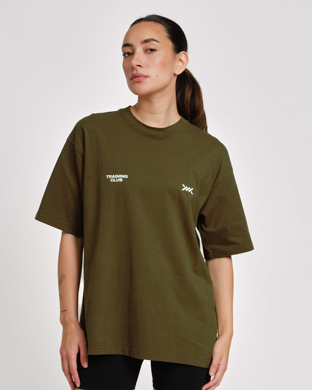 Camiseta Caged Training Club – Caqui verde mujer