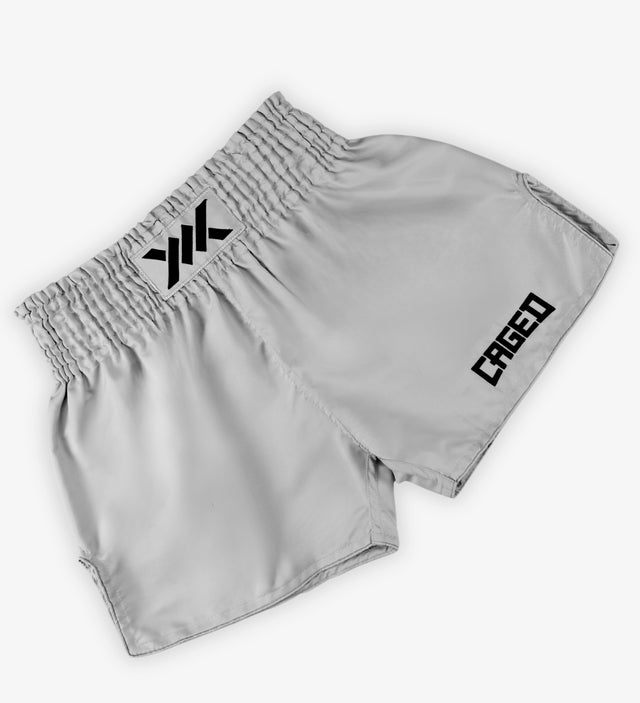 Pantaloni scurți Caged Muay Thai Classic – Gri deschis/Negru