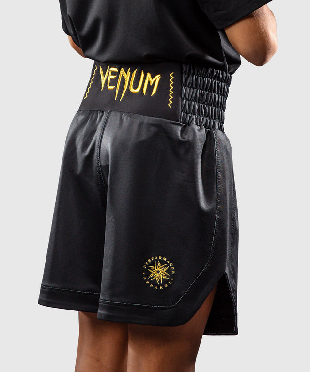 Calções de boxe Venum Attack – Preto/Ouro – Criança