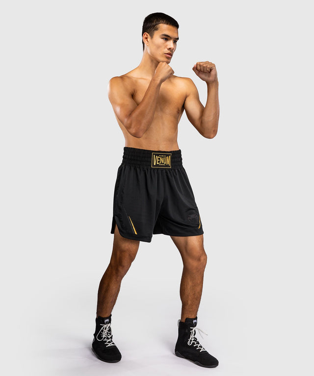 Pantaloncini da boxe Venum G-Core – Nero/Oro