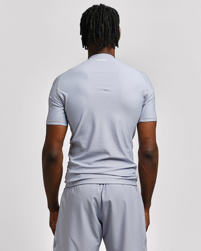 Rashguard Caged Tactical Mangas Curtas – Cinzento Chumbo