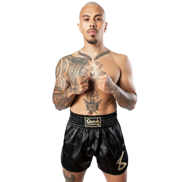 Pantaloncini Muay Thai 8 WEAPONS Strike – Nero/Oro