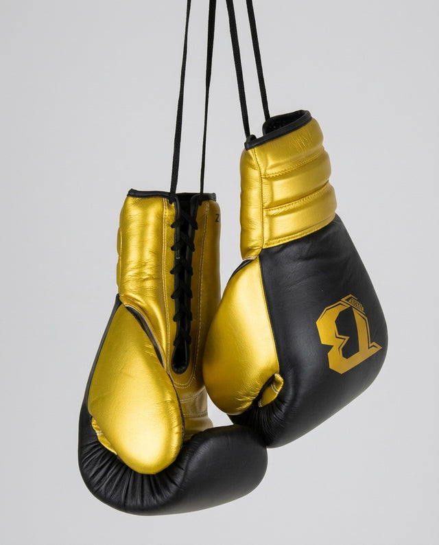 Gants de boxe Booster Rapid Strike à lacets – Noir/Or