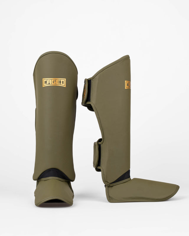 Caged Shadow Shin Guards - Khaki Green/Gold