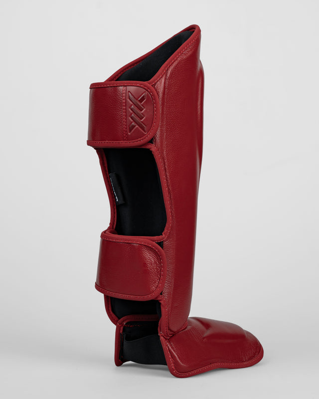 Caged Benskydd 'X' Series – Bordeaux Rött