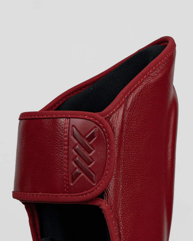 Caged Benskydd 'X' Series – Bordeaux Rött