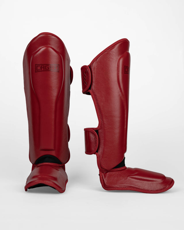 Caged Benskydd 'X' Series – Bordeaux Rött
