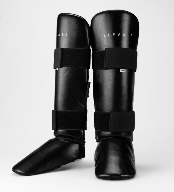 Espinilleras Elevate Prime – Negro