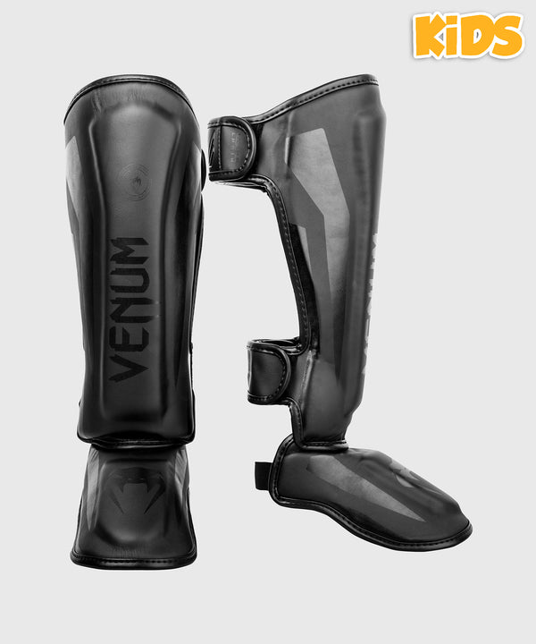 Espinilleras Venum Elite – Negro (Niños)
