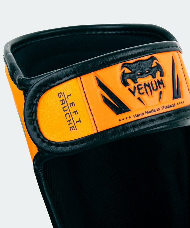 Espinilleras Venum Elite – Naranja Neón