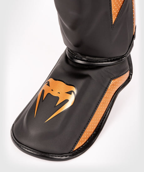Venum Scheenbeschermers Kickboks Elite Evo - Zwart/Brons