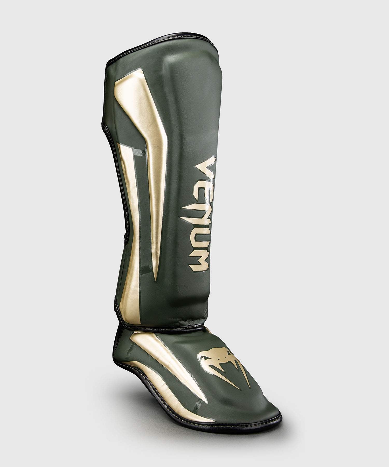 Espinilleras Venum Elite – Caqui/Oro