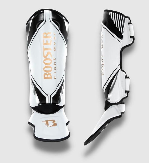 Espinilleras Booster Bangkok – Blanco/Negro/Oro
