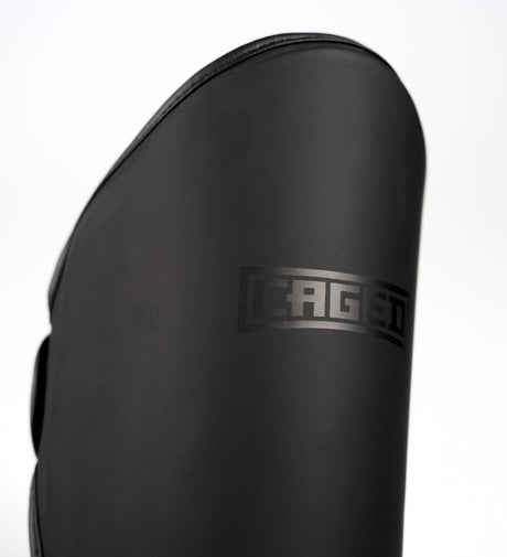 Tibiere Caged Kickboks Shadow – Negru/Negru – Tibiere
