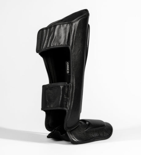 Tibiere Caged Kickboks 'X' Series – Negru/Negru – Tibiere