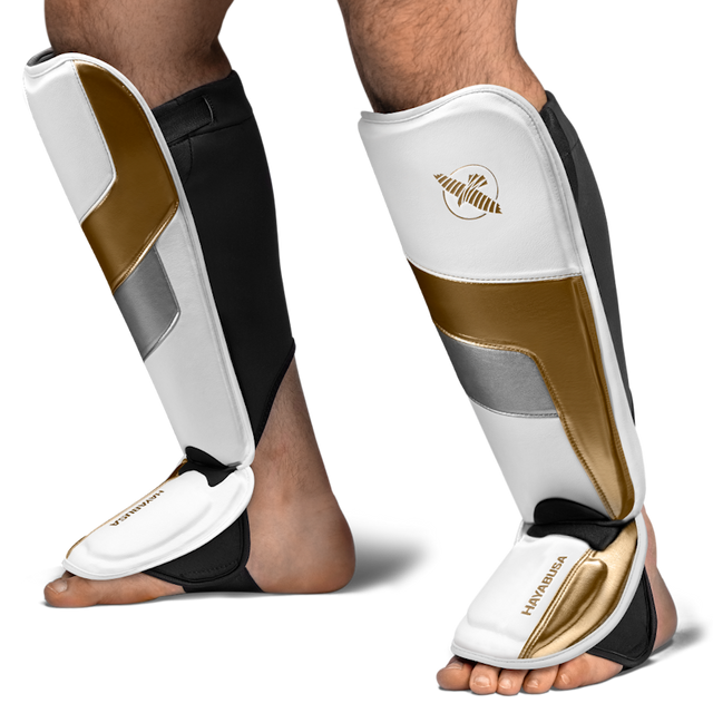 Caneleiras Hayabusa T3 Full – Branco/Ouro