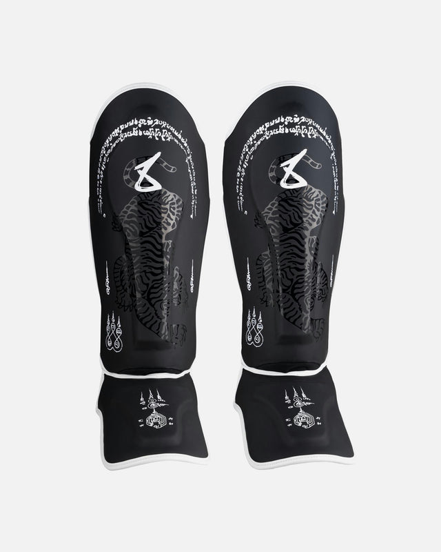 8 WEAPONS Shin guards Sak Yant Big Tiger – Black