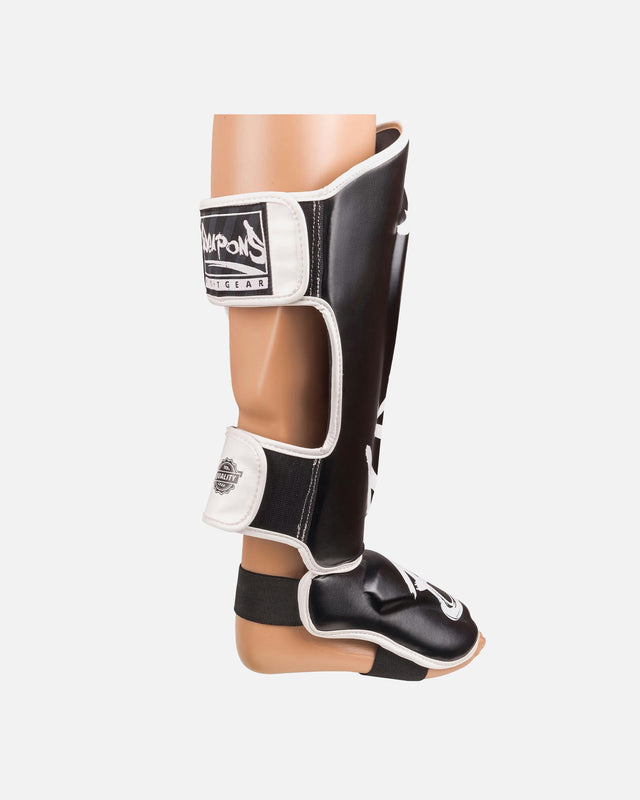 Espinilleras 8 WEAPONS Unlimited 2.0 – Negro/Blanco