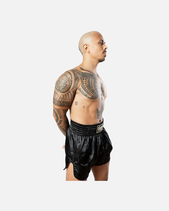 Pantaloncini Muay Thai 8 WEAPONS Strike – Nero/Oro