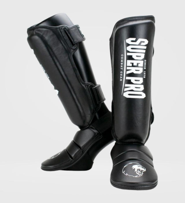 Caneleiras de kickboxing Super Pro Protector – Preto/Branco – Caneleiras