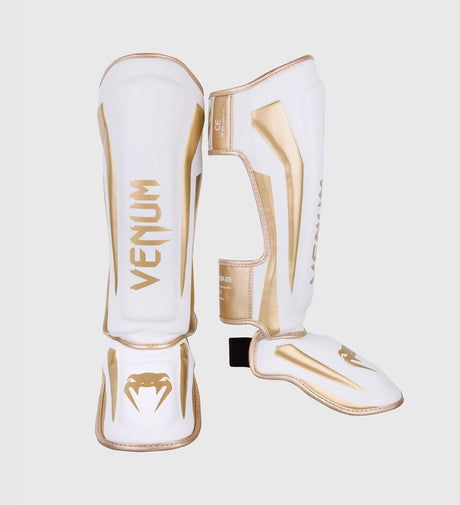 Chrániče holení Venum Elite – Bílé/Zlaté